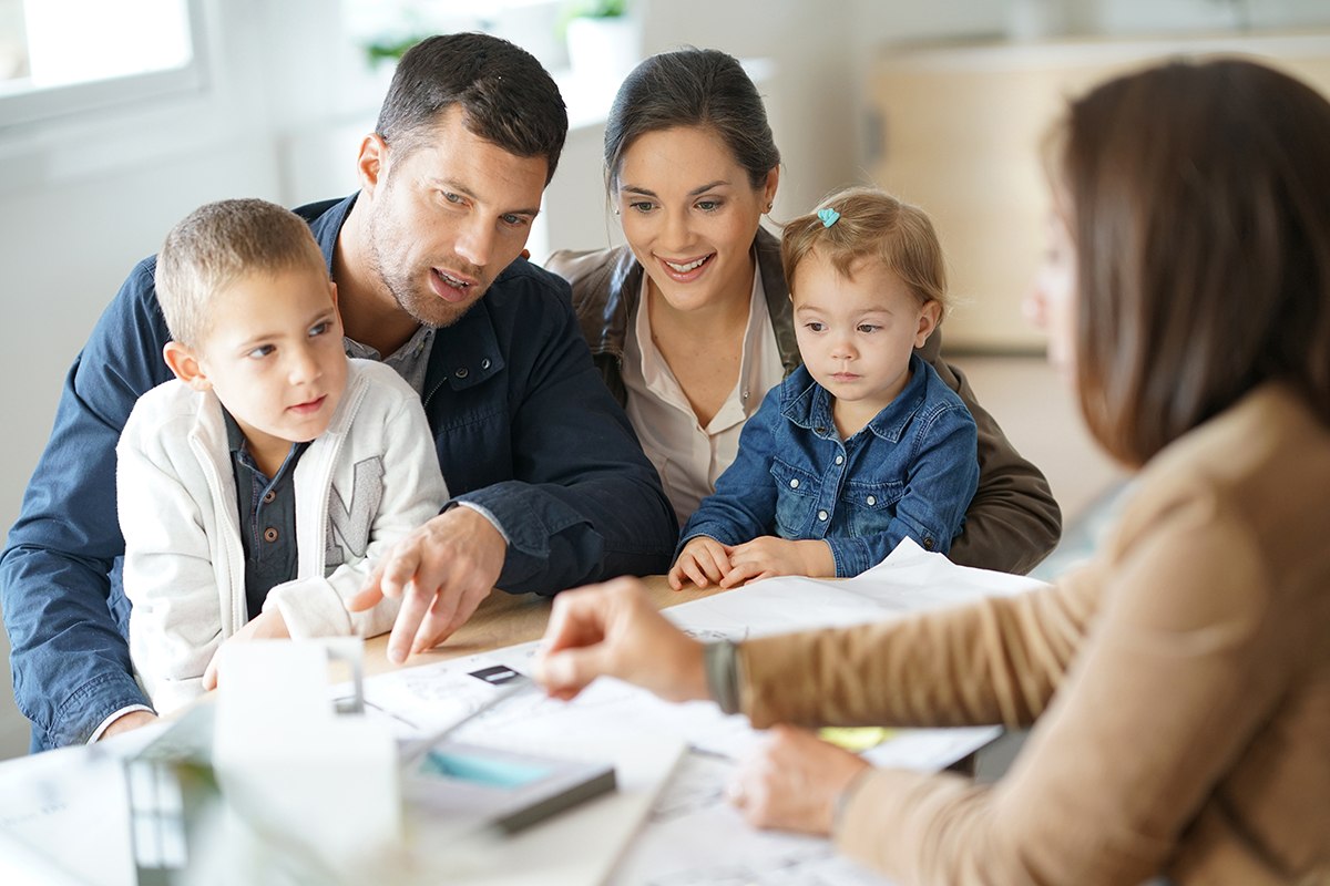 a family reviewing insurance plans